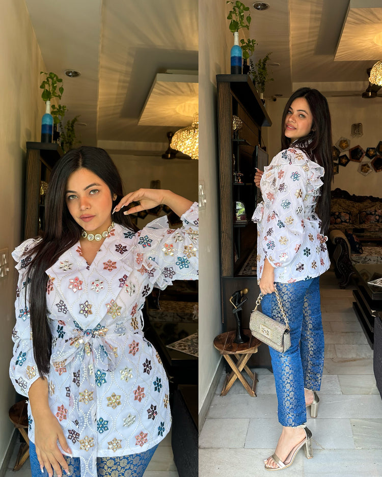 White embroidered top and pants